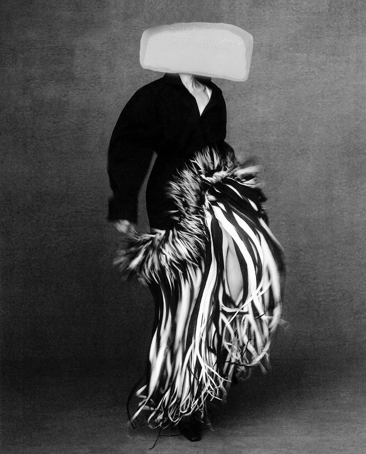 model jumping in long striped stranded skirt